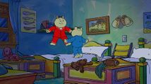Tommy and Timmy Tibble jumping in bed.jpg